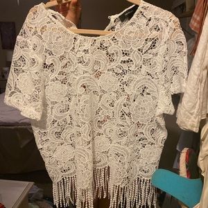 Forever 21 beautiful embroidered top with fringe at the bottom